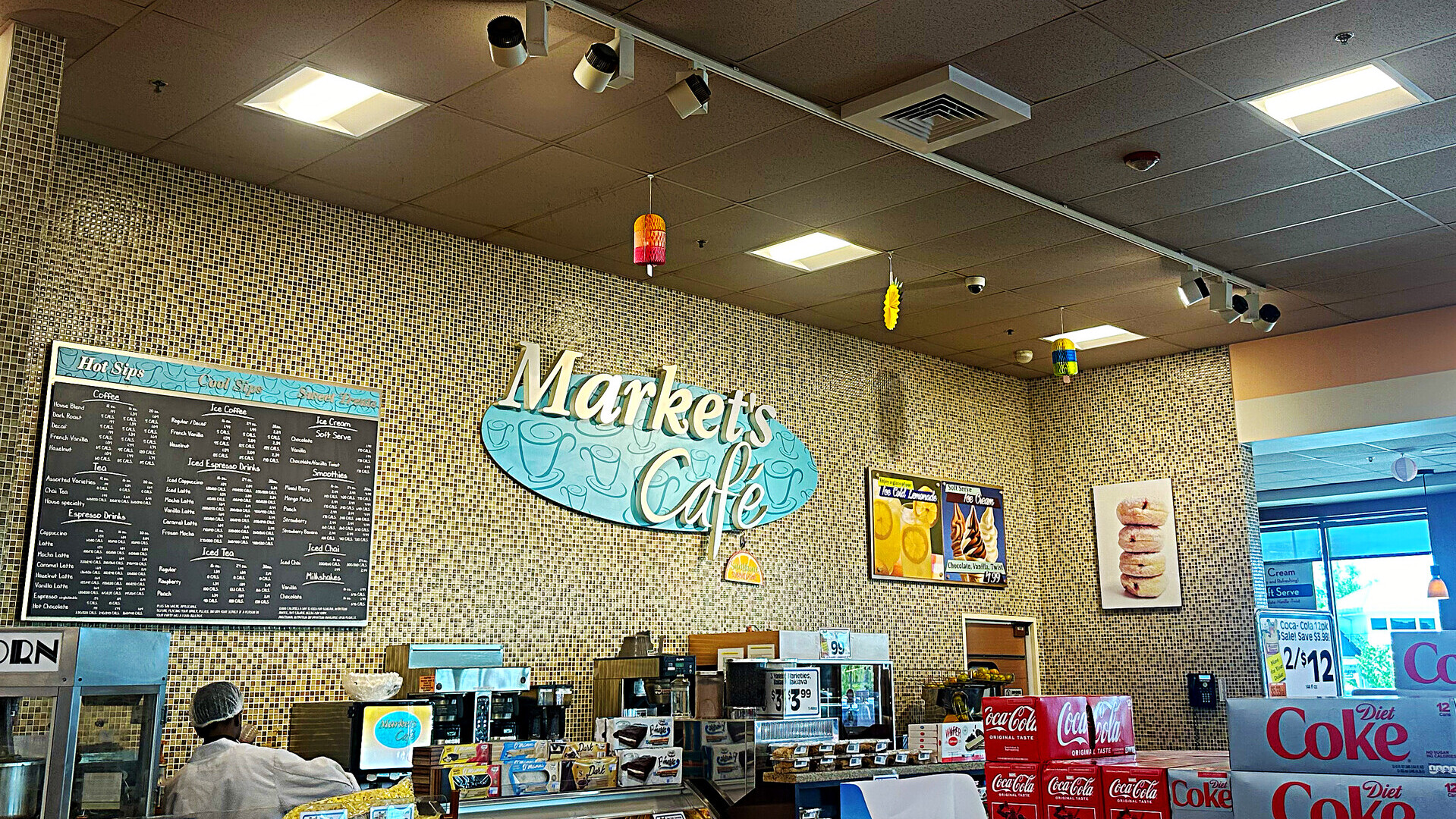 Retail cafe ceiling lit with recessed LED fixtures