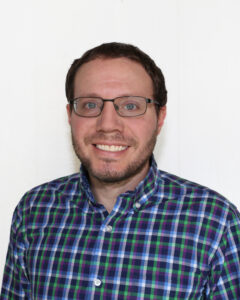 BABA WOSB Compliant Jeremy plaid shirt headshot.