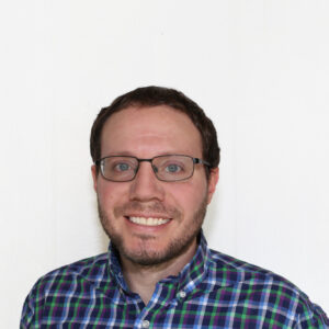 BABA WOSB Compliant Jeremy plaid shirt headshot.